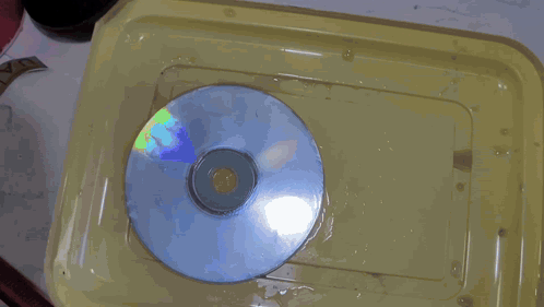 A Close Up Of A Person Holding A Piece Of Paper That Says ' 3M ' On It GIF