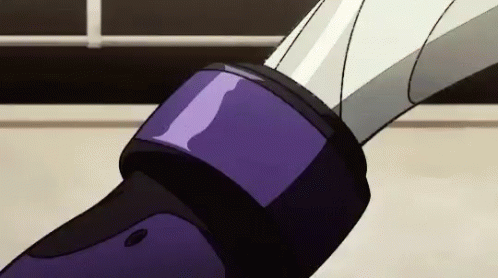 A Close Up Of A Person Holding A Sword With A Purple And Black Strap . GIF
