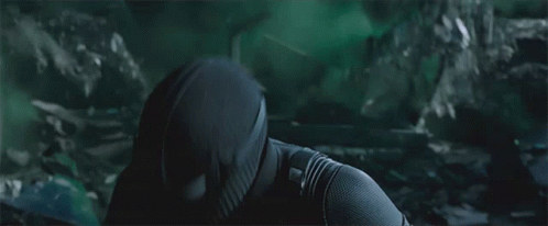 a close up of a person in a black mask