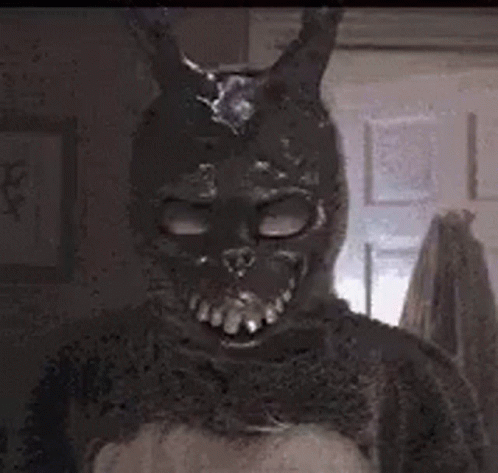 A Close Up Of A Person In A Bunny Costume With A Light Coming Out Of His Eyes . GIF