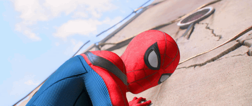 A Close Up Of A Person In A Spider Man Costume GIF