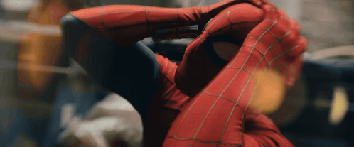 A Close Up Of A Person In A Spider-Man Costume GIF