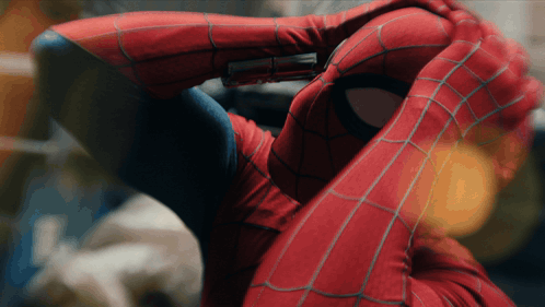 a close up of a person in a spider-man costume