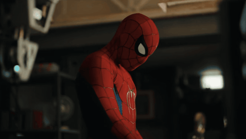 a close up of a person in a spiderman suit