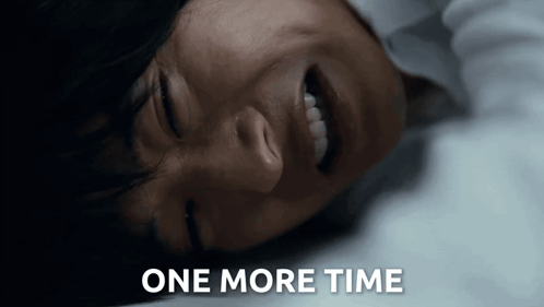 a close up of a person laying down with the words one more time written below them