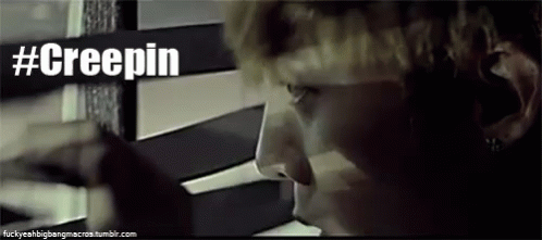 A Close Up Of A Person Looking Out A Window With The Words #Creepin Written Above Them GIF