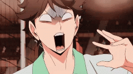 A Close Up Of A Person Making A Funny Face With Their Hand . GIF