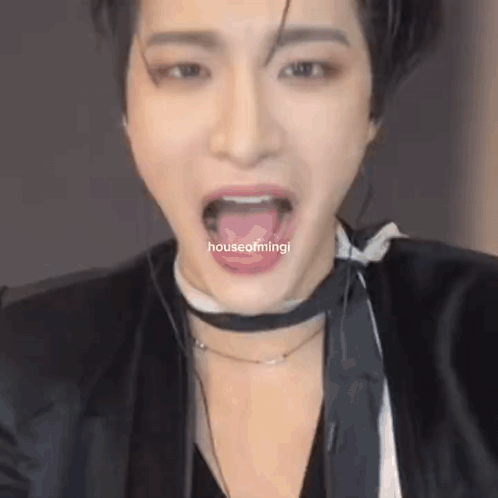 A Close Up Of A Person Making A Funny Face With Their Tongue Out . GIF