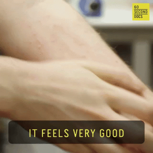 A Close Up Of A Person 'S Arm And The Words It Feels Very Good GIF
