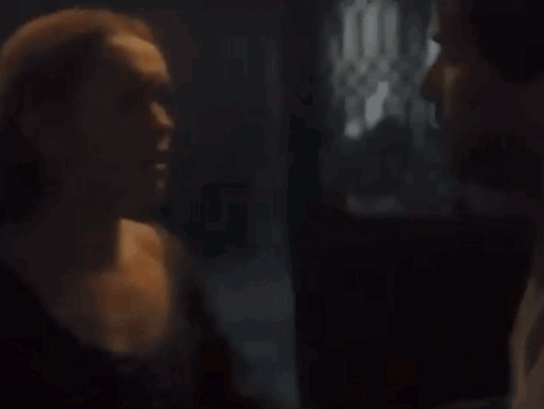 A Close Up Of A Person 'S Arm In A Dark Room With A Black Background . GIF