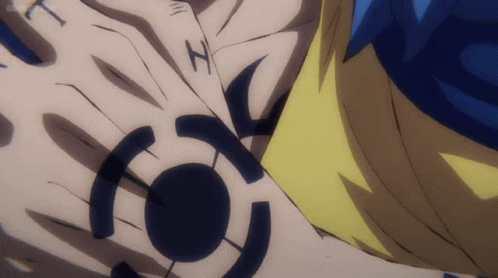 A Close Up Of A Person 'S Arm With A Black Tattoo On It GIF
