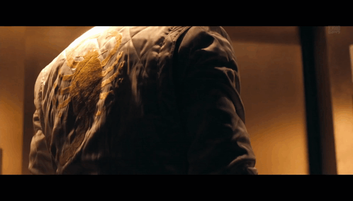 A Close Up Of A Person 'S Back With A Stain On It GIF