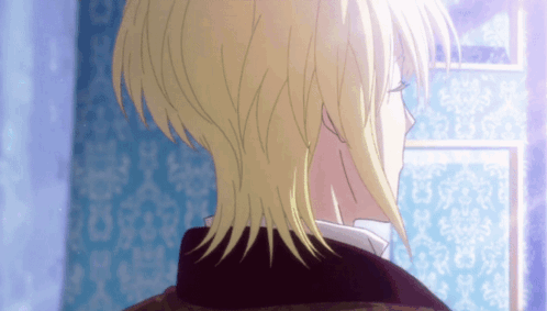 A Close Up Of A Person 'S Back With Blonde Hair GIF