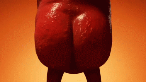 A Close Up Of A Person 'S Butt Against An Orange Background . GIF