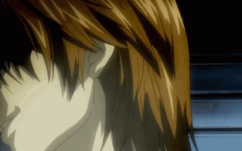 A Close Up Of A Person 'S Ear With A Black Background GIF