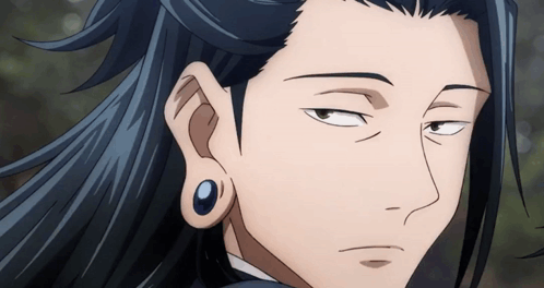 A Close Up Of A Person 'S Ear With Piercings GIF