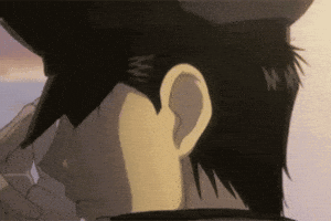 A Close Up Of A Person 'S Ear With The Letters M And W On It GIF
