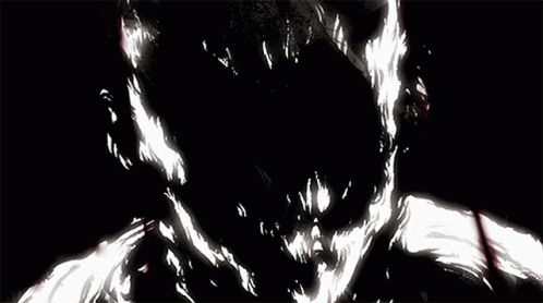 A Close Up Of A Person 'S Eye With A Mouth Open GIF