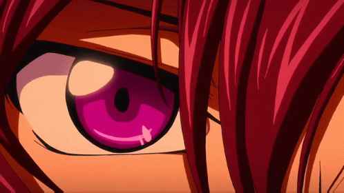 a close up of a person 's eye with a purple pupil