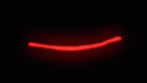 A Close Up Of A Person 'S Eye With Blood Dripping Out Of It . GIF