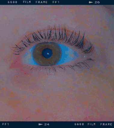 A Close Up Of A Person 'S Eye With The Number 6688 Film Frame On The Bottom GIF