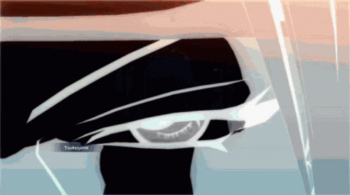 A Close Up Of A Person 'S Eye With Tsukiyomi Written On The Bottom Right Corner GIF