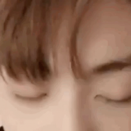 A Close Up Of A Person 'S Eyes Closed . GIF
