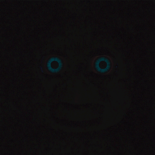 A Close Up Of A Person 'S Eyes That Are Glowing GIF
