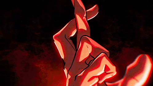A Close Up Of A Person 'S Eyes With A Hand Pointing GIF