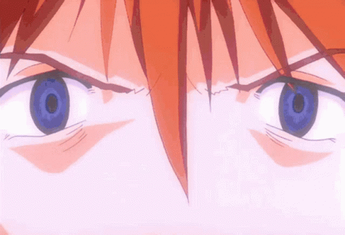 Close Up Of Person's Red Hair And Eyes GIF