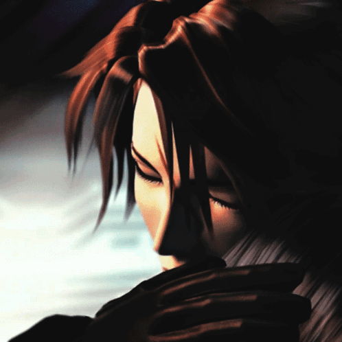 A Close Up Of A Person 'S Face In A Dark Room GIF
