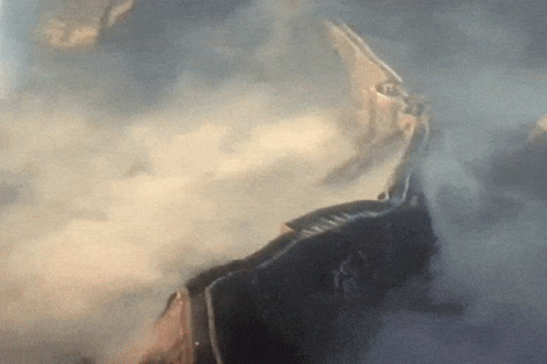 A Close Up Of A Person 'S Face In A Foggy Area GIF