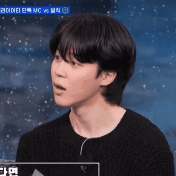 A Close Up Of A Person 'S Face In Front Of A Sign That Says Mc GIF