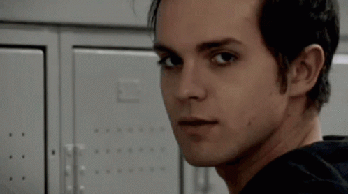 A Close Up Of A Person 'S Face Looking At Something GIF