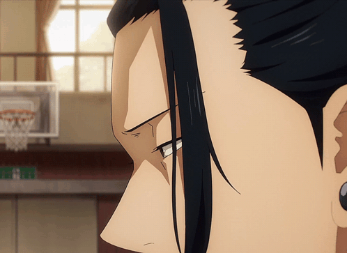 A Close Up Of A Person 'S Face With A Basketball Hoop Behind Them GIF