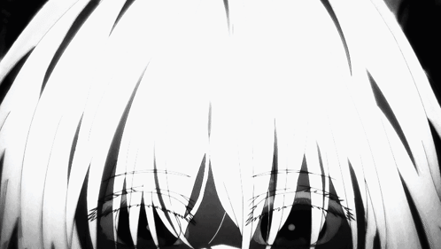 A Close Up Of A Person 'S Face With A Black Background GIF