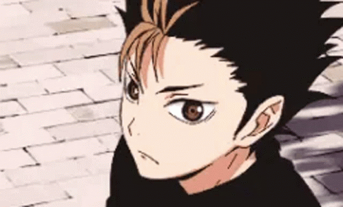 A Close Up Of A Person 'S Face With A Black Shirt On . GIF