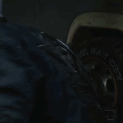A Close Up Of A Person 'S Face With A Blue Jacket GIF