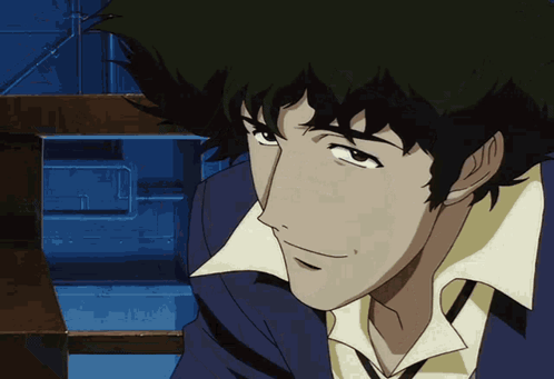 A Close Up Of A Person 'S Face With A Blue Jacket On GIF