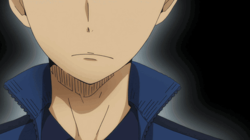 A Close Up Of A Person 'S Face With A Blue Shirt On GIF