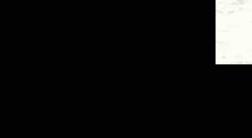 A Close Up Of A Person 'S Face With A Blurred Background . GIF
