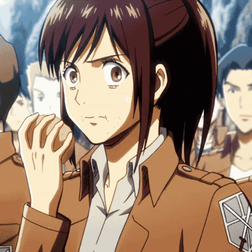 A Close Up Of A Person 'S Face With A Brown Jacket GIF