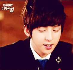 A Close Up Of A Person 'S Face With A Foreign Language Written On The Bottom GIF