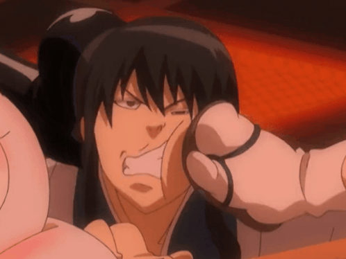 A Close Up Of A Person 'S Face With A Glove On GIF