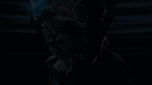 A Close Up Of A Person 'S Face With A Grid On It GIF