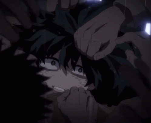 A Close Up Of A Person 'S Face With A Hand Holding It GIF