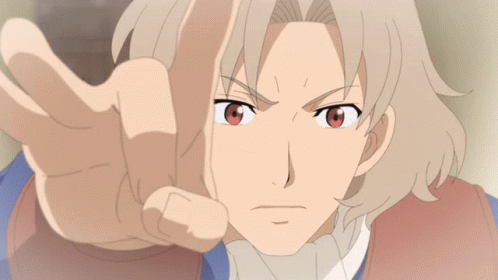A Close Up Of A Person 'S Face With A Hand Pointing At The Camera GIF