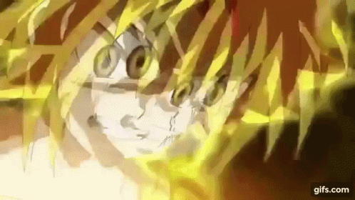A Close Up Of A Person 'S Face With A Lot Of Yellow Glowing Lines Coming Out Of It . GIF