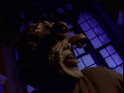 A Close Up Of A Person 'S Face With A Mask On GIF