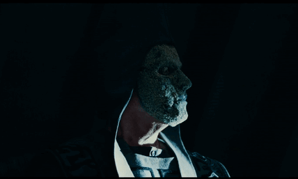 A Close Up Of A Person 'S Face With A Mask On It GIF